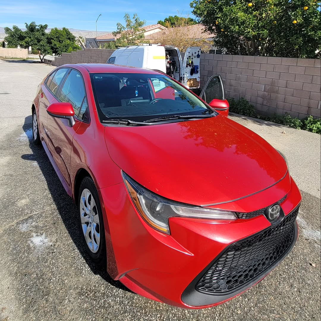 Freshly detailed red Toyota Corolla